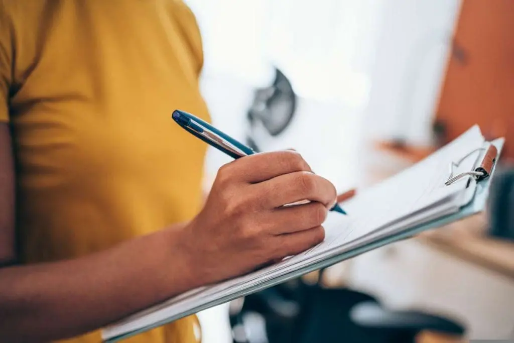 Official noting down details for the DOT diabetes assessment form