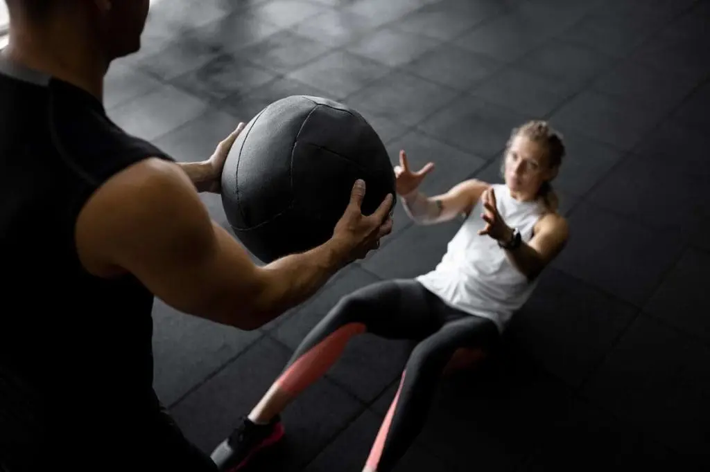 A patient undergoing work conditioning therapy, focusing on physical strength and mobility.