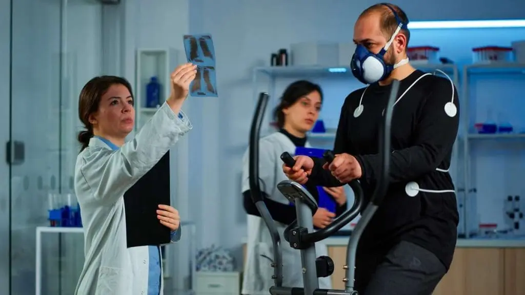 Patient participating in a work hardening therapy session, emphasizing physical and mental exercises.