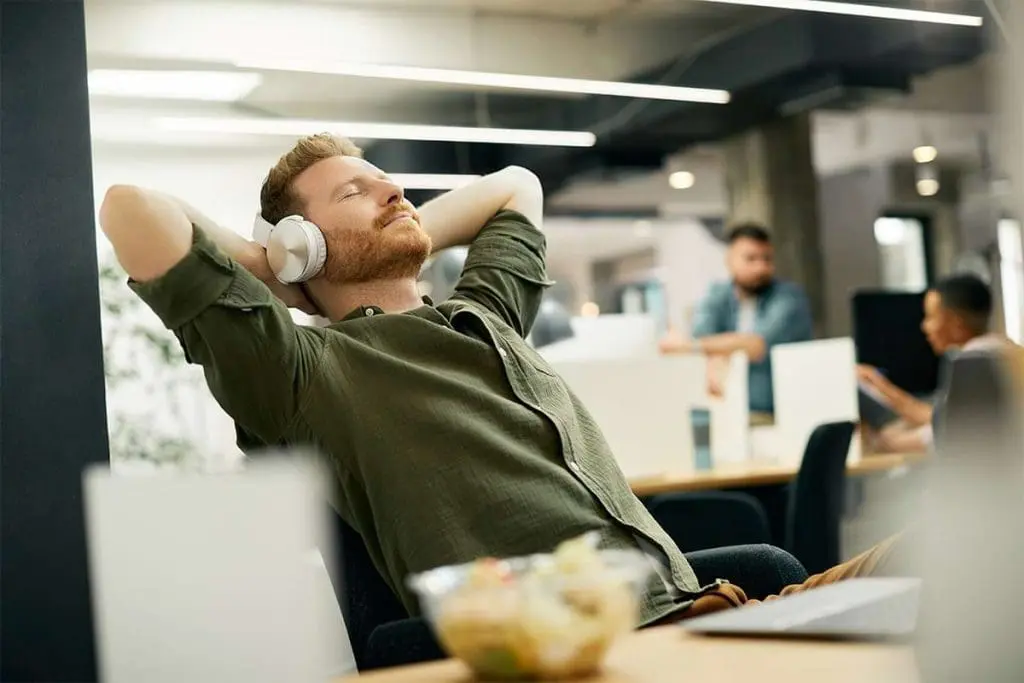 Employee taking a relaxing break, promoting mental health at work