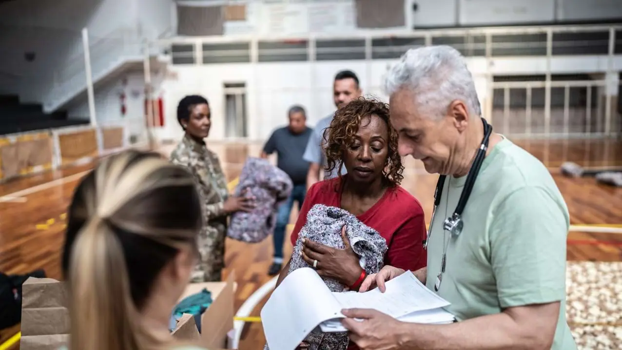 Specialist coordinating humanitarian relief after UXO removal