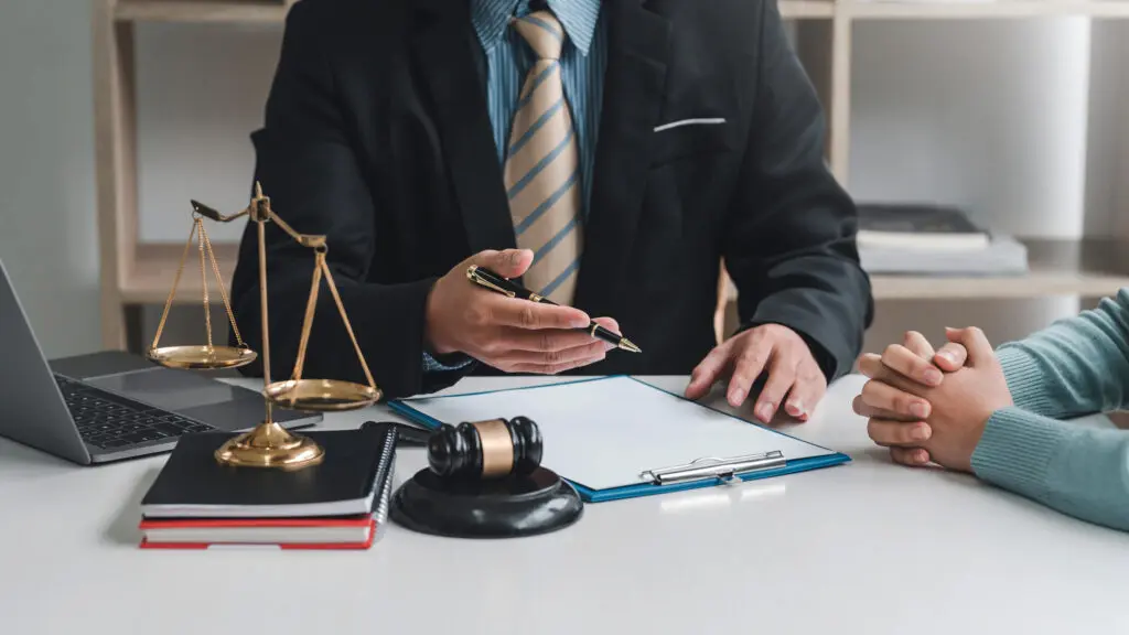 Lawyer explaining drug testing policies and compliance requirements to an employer