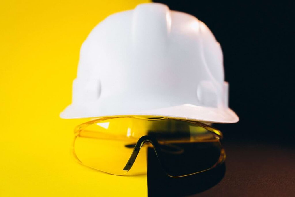 ard hat on workplace report illustrating the importance of safety in the workplace examples