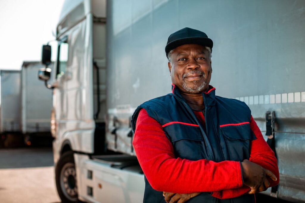 A happy truck driver who has passed the HHS DOT mirror drug test